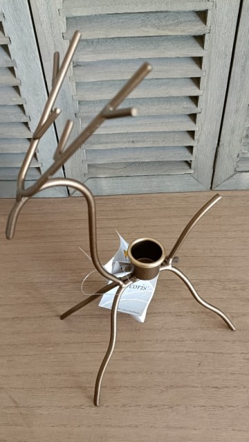 Kaarsenstandaard in vorm van een eland bovenaf