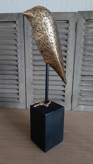 Vinci vogel op voet zijkant